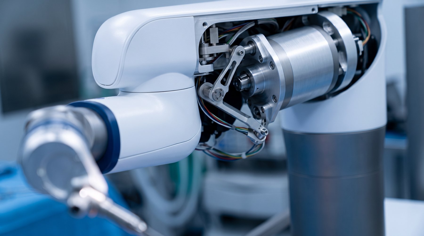 Close-up of a surgical robot joint with its drive mechanism exposed