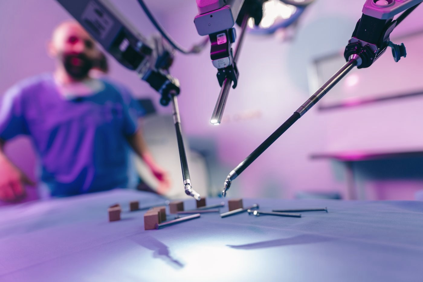 Robotic surgery system operating over a patient in the operating room
